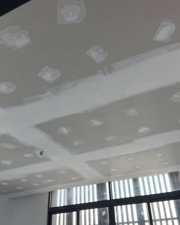Plaster Ceiling Joint Filling Stage - Cyberjaya Plaster ceiling drywall joints and screw holes filled with joint compound before sanding, Cyberjaya cove light ceiling project