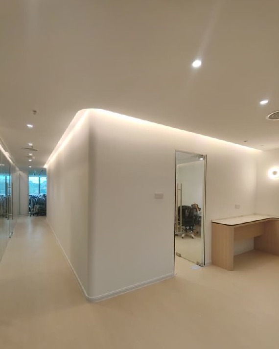 Curved Partition Wall with Cove Lighting - Southbank Residence Office Curved plaster partition wall with recessed cove lighting and flush ceiling in Southbank Residence strata office renovation, Old Klang Road, Kuala Lumpur