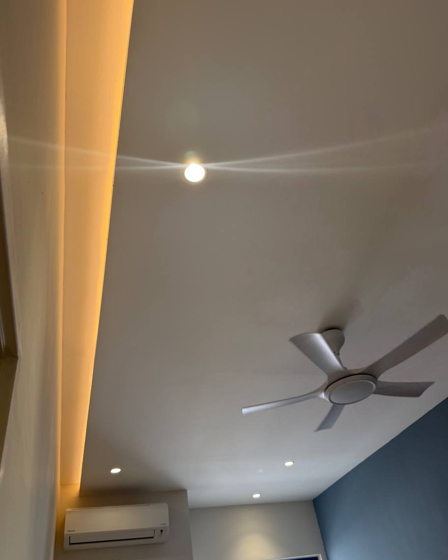 Curved Plaster Ceiling with LED Strip Lighting - Rawang Curved plaster ceiling drop with warm LED strip lighting, recessed downlights, spotlight, and ceiling fan in Rawang residential home