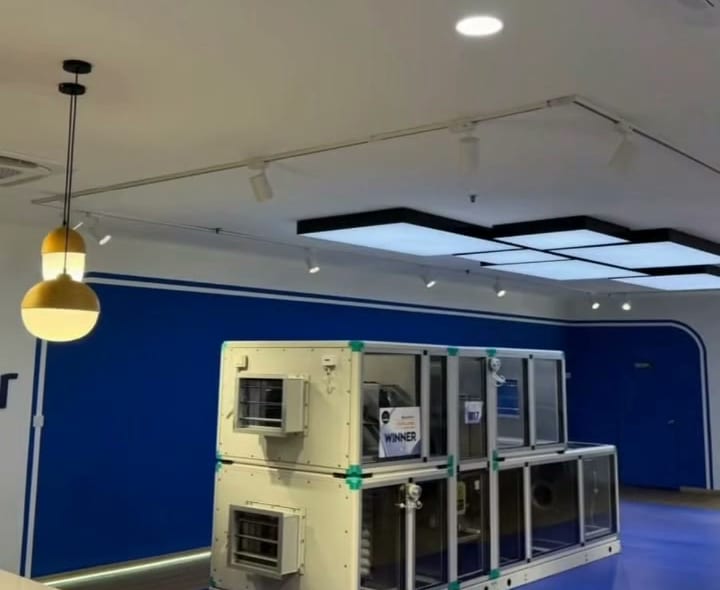 Floating Ceiling Panels – Shah Alam Office Floating ceiling panels with track lights over an office showroom area, Shah Alam office renovation