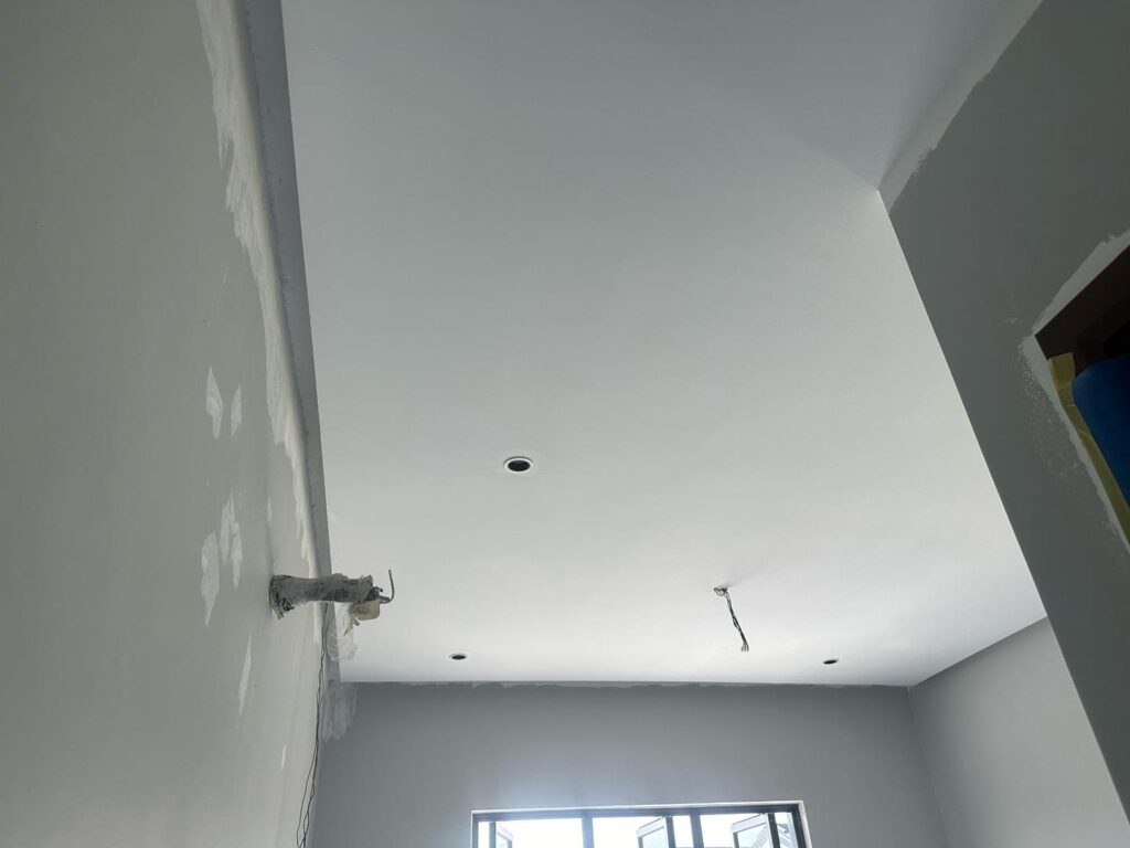 Plaster ceiling project in Cyberjaya showing neat wiring setup and wall preparation before paint and lighting installation.