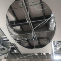 Suspended plaster ceiling with integrated ductwork.