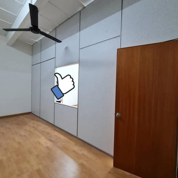 A completed room with dust-reducing acoustic partition walls and wooden door, offering a clean, modern, and quiet environment. Ideal for KL offices, studios, or classrooms.
