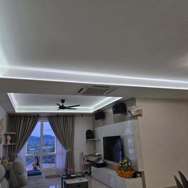 A sleek plaster ceiling design with hidden LED lighting for a contemporary living room interior in Kuala Lumpur. Tailored for comfort and visual elegance.