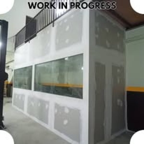 Exterior dust-reducing wallboard installation underway. Designed for improved insulation and sleek facade. Project by YK Plasterceil.