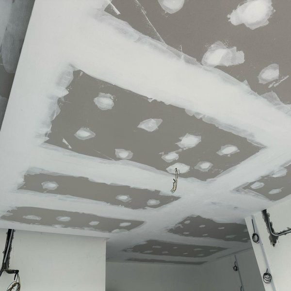 Plaster ceiling jointing in progress for a double-layer ceiling design at a Bukit Jalil residence. This stage prepares the ceiling for smooth finishing and modern lighting fixtures.